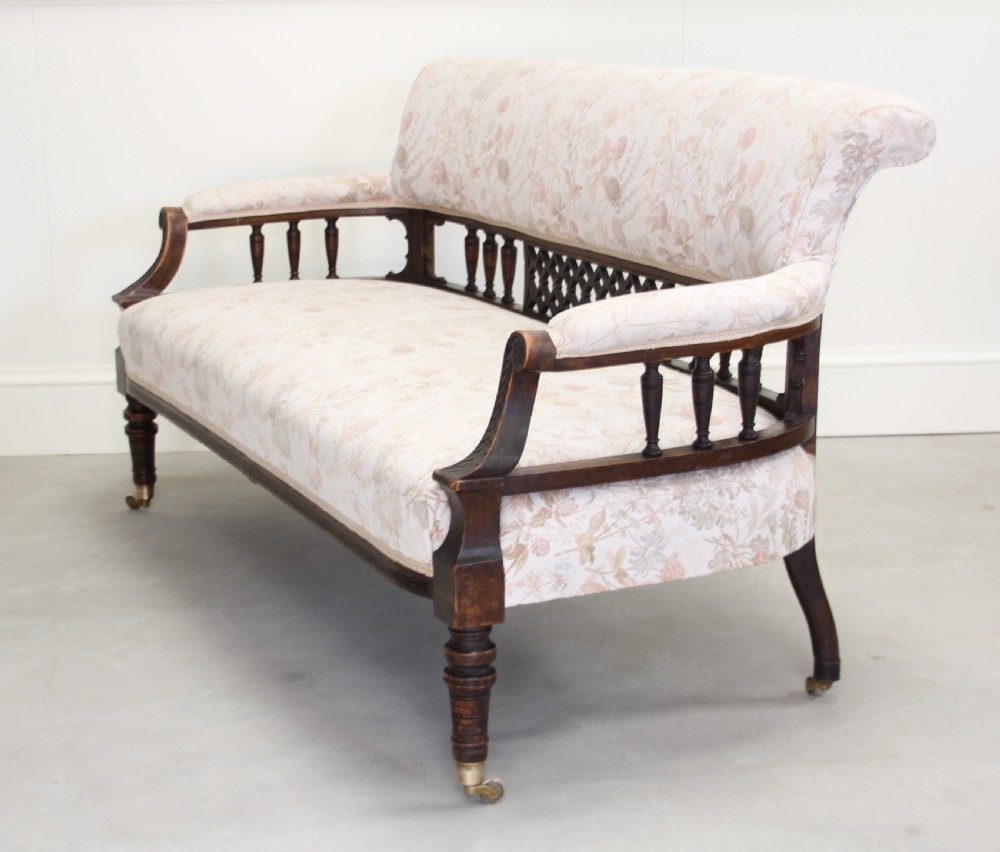 A Victorian Walnut salon three piece suite. View VI