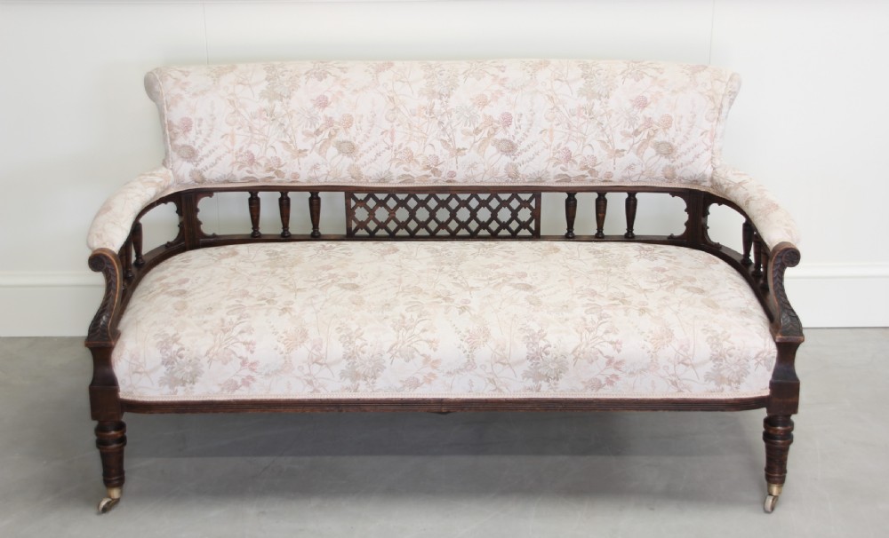 A Victorian Walnut salon three piece suite. View XI