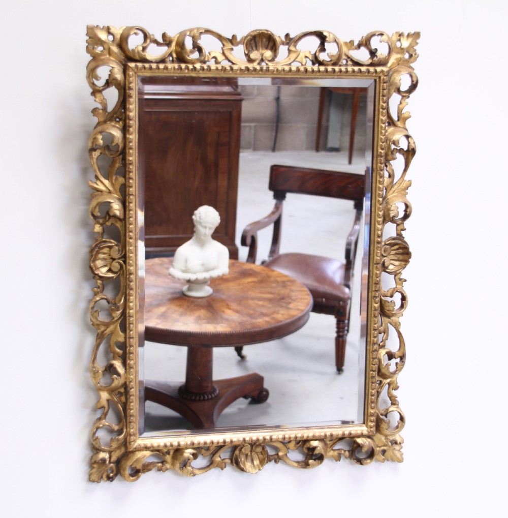 A 19th century Florentine wall mirror.