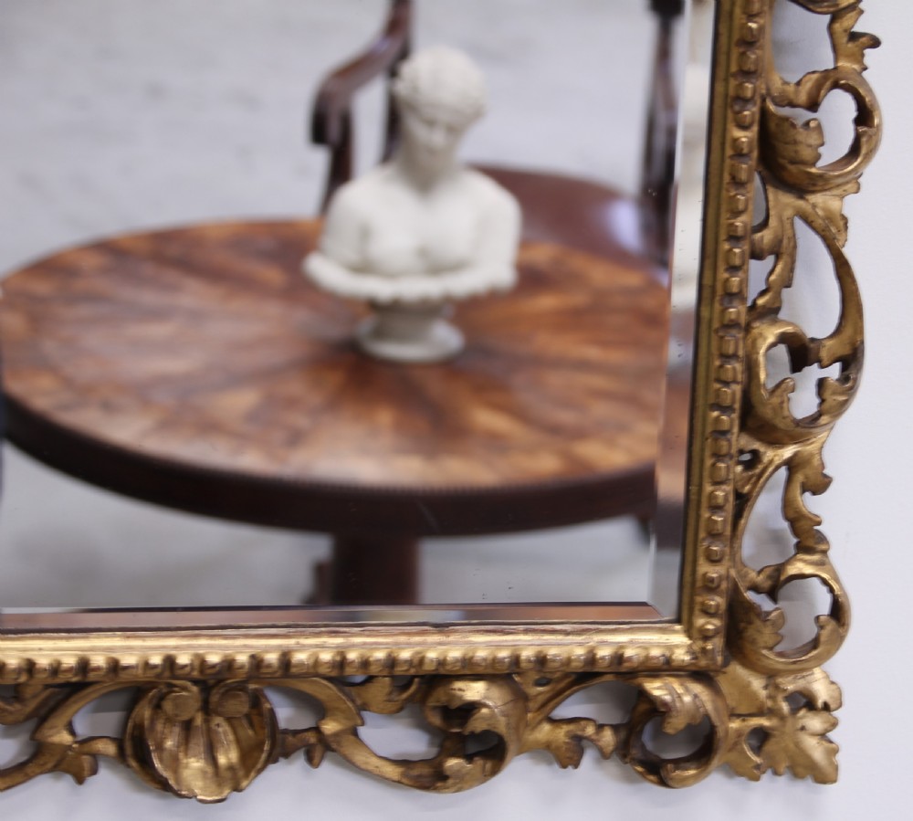 A 19th century Florentine wall mirror. View II