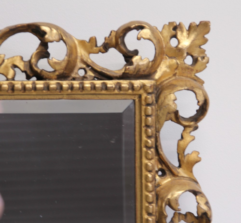 A 19th century Florentine wall mirror. View III