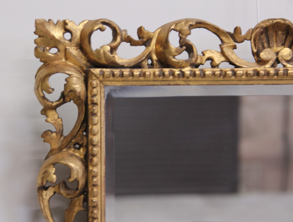 A 19th century Florentine wall mirror. View V
