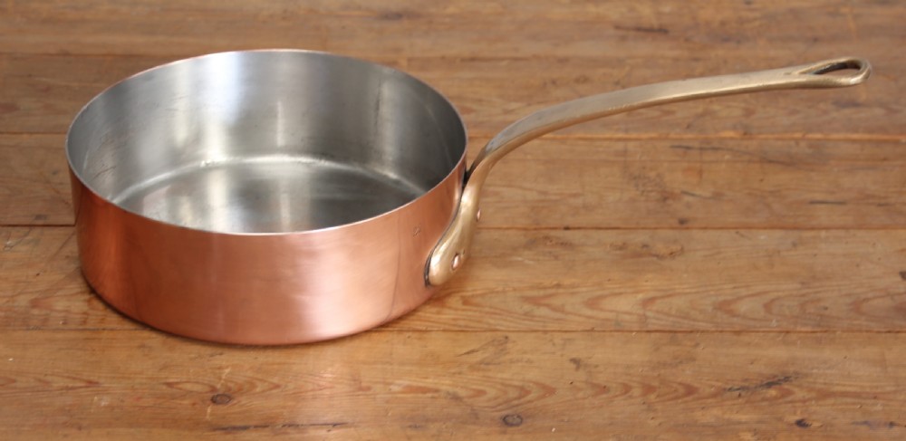 A collection of 19th century copper saucepans  View VII