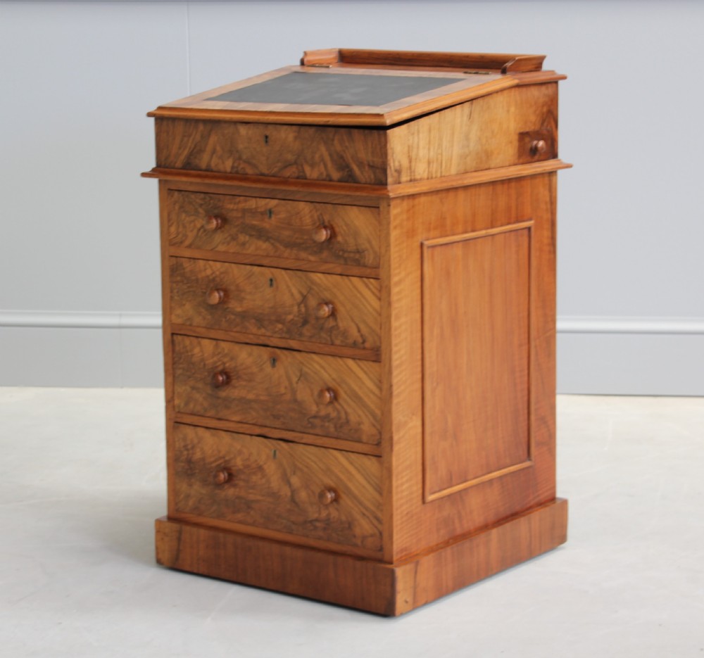 A Victorian burr walnut davenport. View III