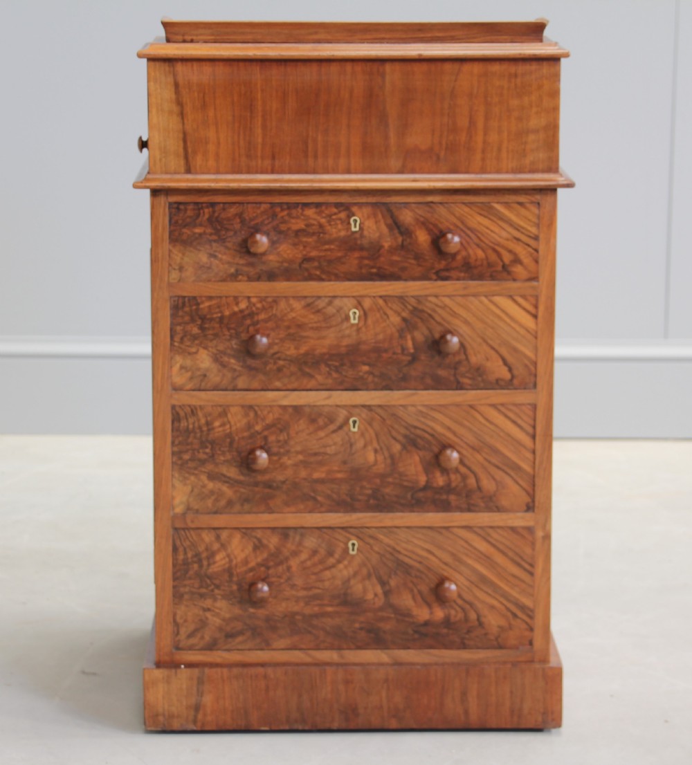 A Victorian burr walnut davenport. View V
