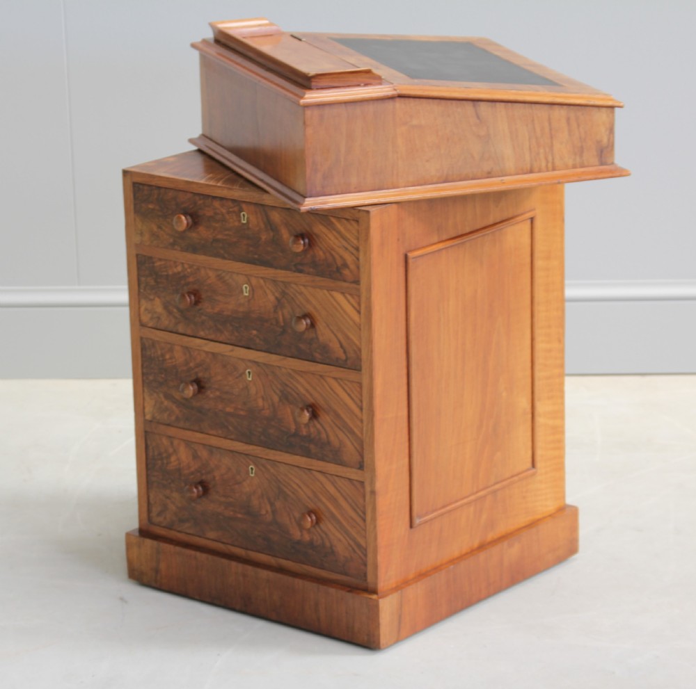 A Victorian burr walnut davenport. View VI