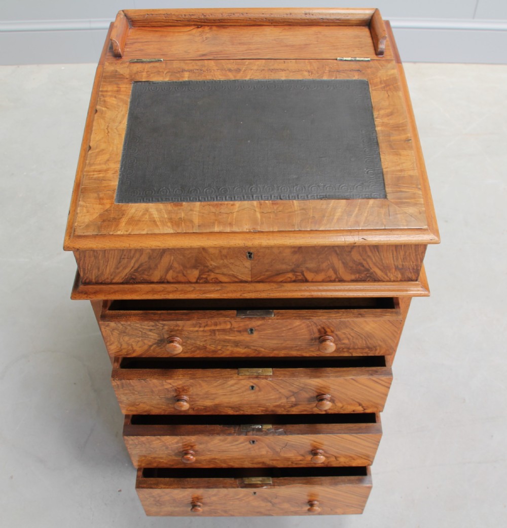 A Victorian burr walnut davenport. View VII