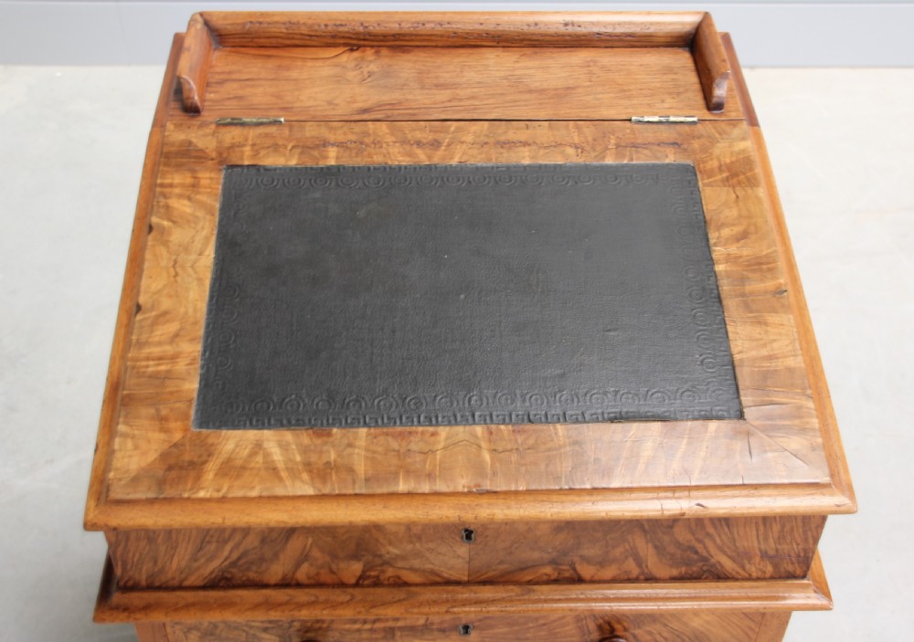 A Victorian burr walnut davenport. View VIII