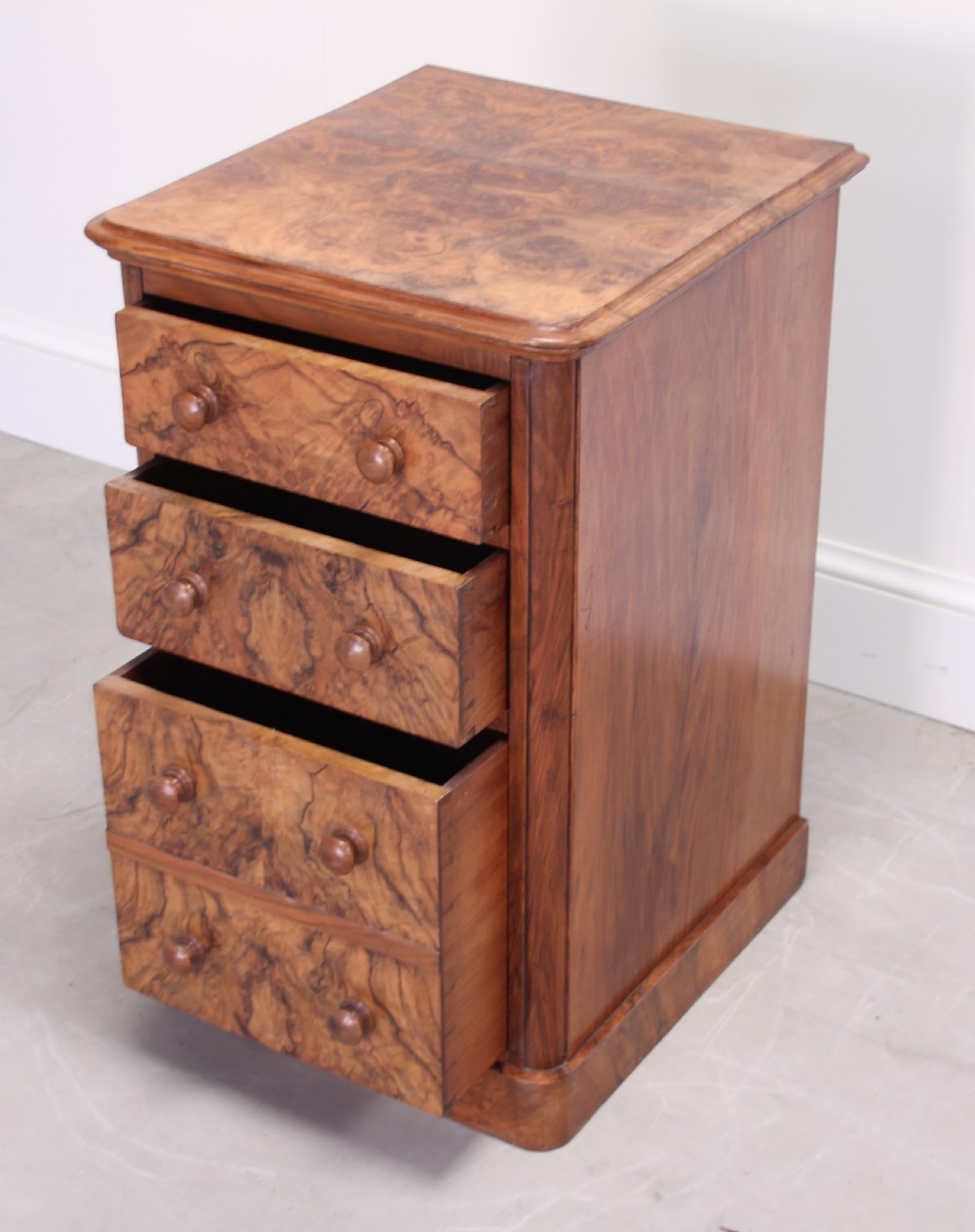 A 19th century burr walnut bedside cabinet. View VI