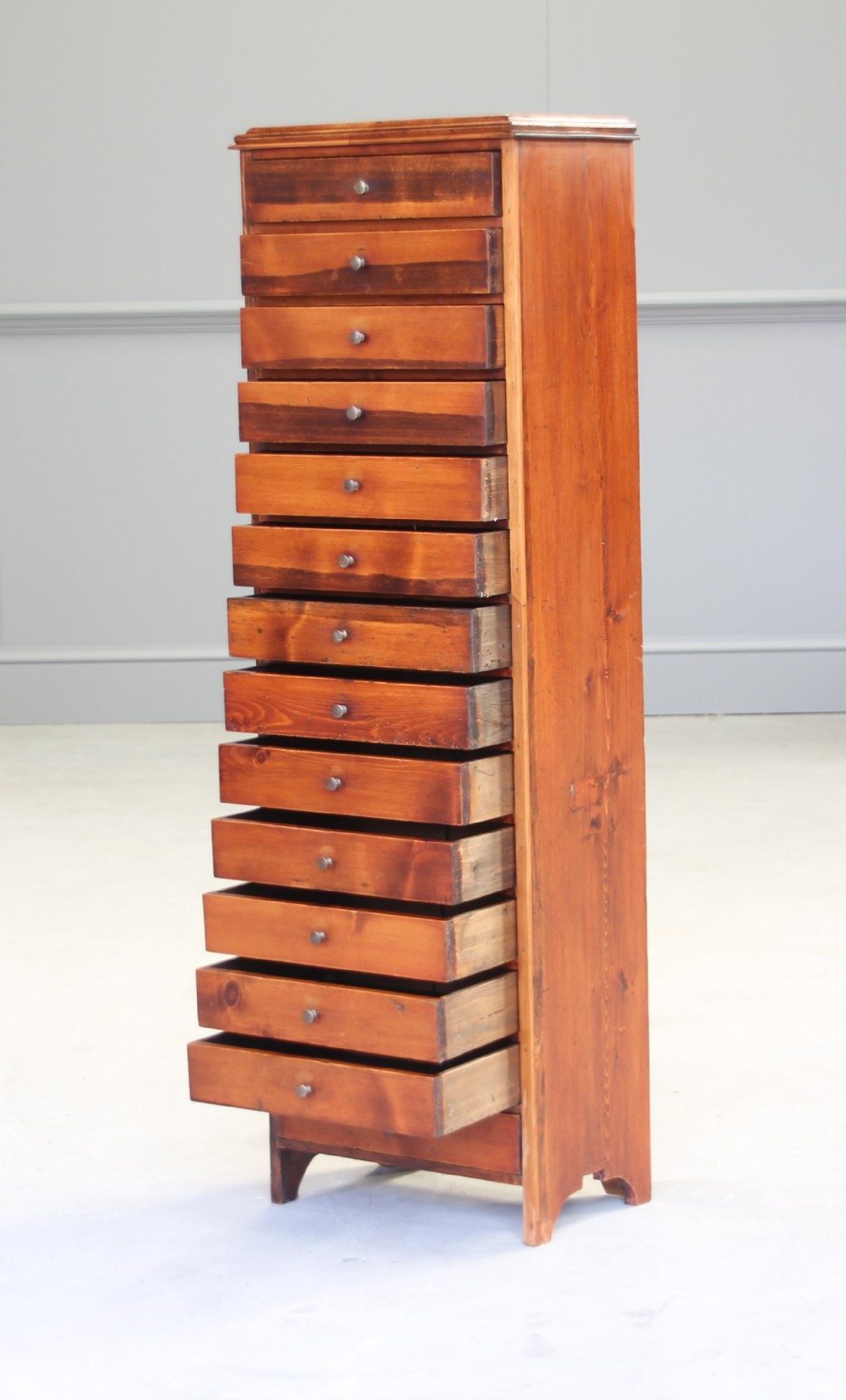 An early 20th century Pine Artist Cabinet 