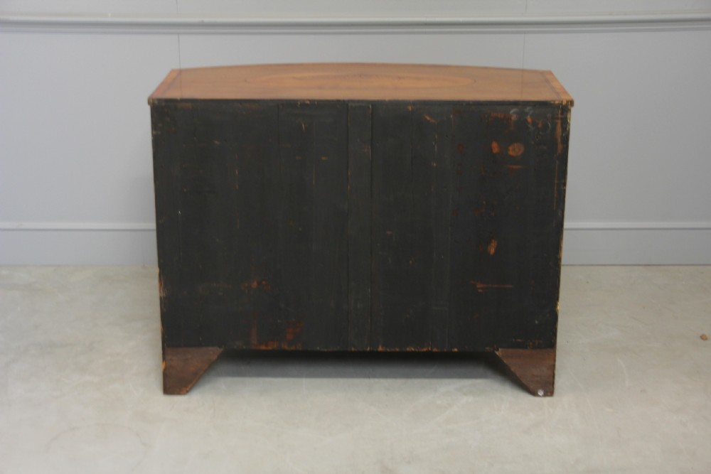 A 19th century Bow fronted Satinwood side cabinet View IX