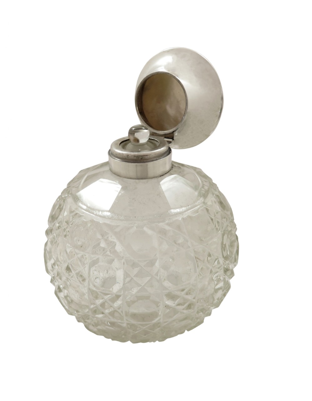 A 1922 globose cut glass scent bottle featuring a sterling silver hinged lid inset with smooth mother of pearl. View VI