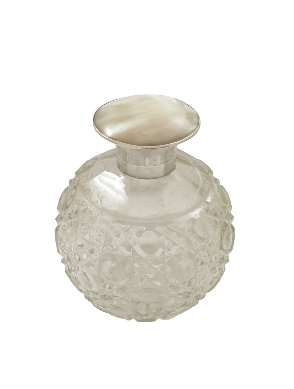A 1922 globose cut glass scent bottle featuring a sterling silver hinged lid inset with smooth mother of pearl. View IX