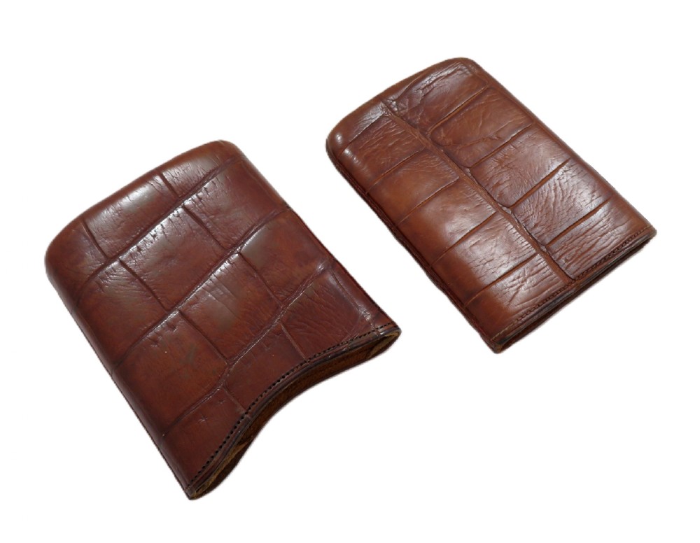 An antique Victorian warm brown crocodile leather pocket cigar case featuring a textured hide exterior and telescopic sleeve design. View II
