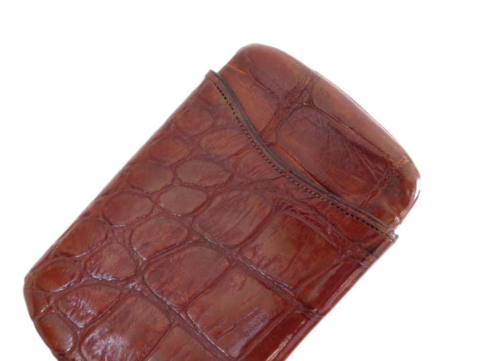 An antique Victorian warm brown crocodile leather pocket cigar case featuring a textured hide exterior and telescopic sleeve design. View III