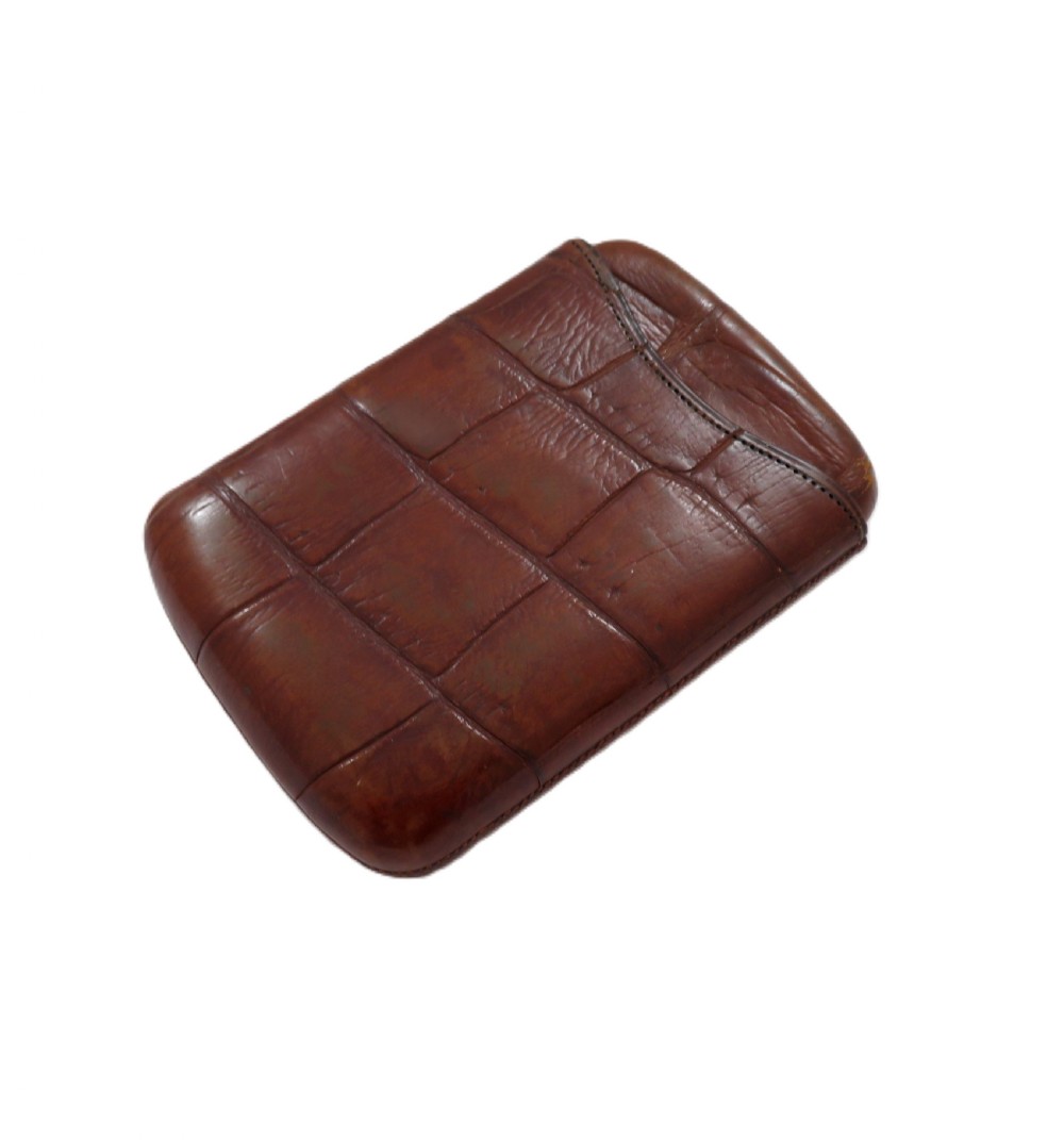 An antique Victorian warm brown crocodile leather pocket cigar case featuring a textured hide exterior and telescopic sleeve design. View IX