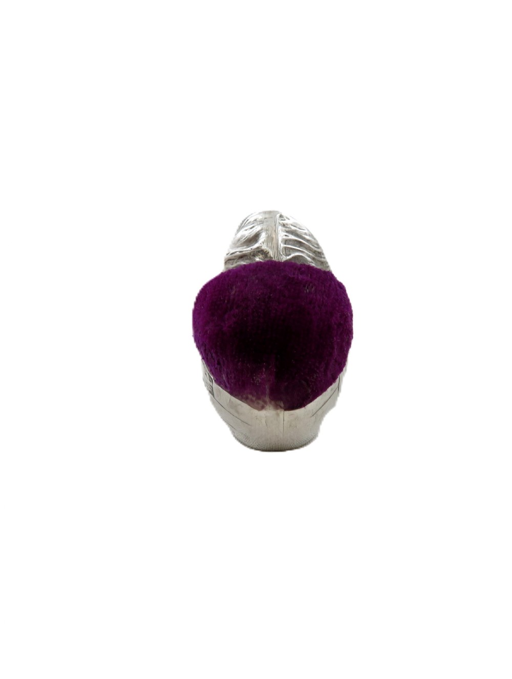 An Edwardian sterling silver pin cushion crafted in the shape of a chick with a purple velvet cushion inset into its back. View VI