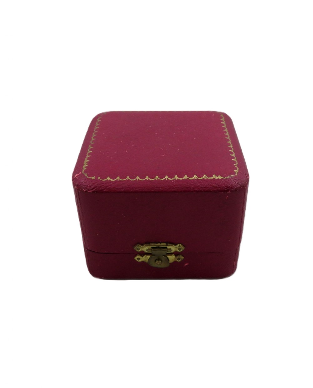 An engraved sterling silver napkin ring resting inside an open red leather presentation case lined with dark red velvet and cream silk. View VII