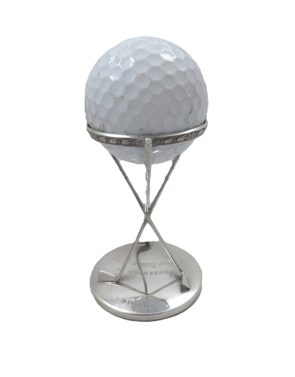 A sterling silver golf ball stand featuring three crossed golf club legs supported by a circular silver base holding a white golf ball. View VIII