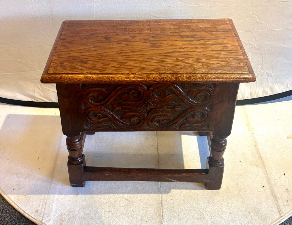 Early 20th century carved oak box stool View II