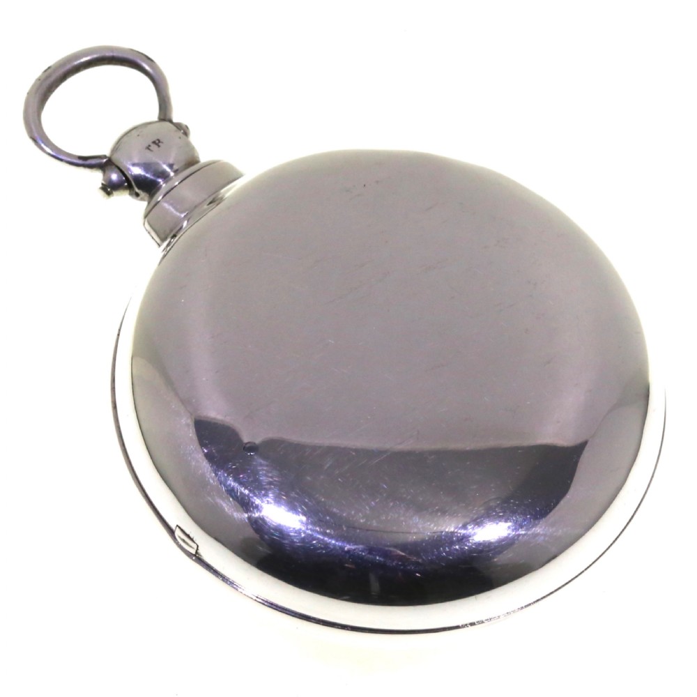 A Victorian silver verge pair cased pocket watch with a white dial and black Roman numerals. View II