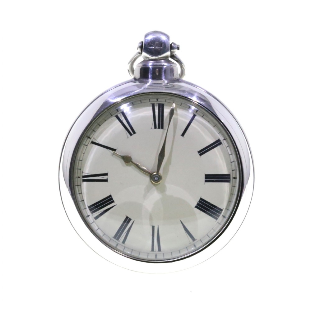 A Victorian silver verge pair cased pocket watch with a white dial and black Roman numerals.