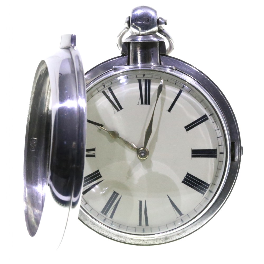 A Victorian silver verge pair cased pocket watch with a white dial and black Roman numerals. View IV