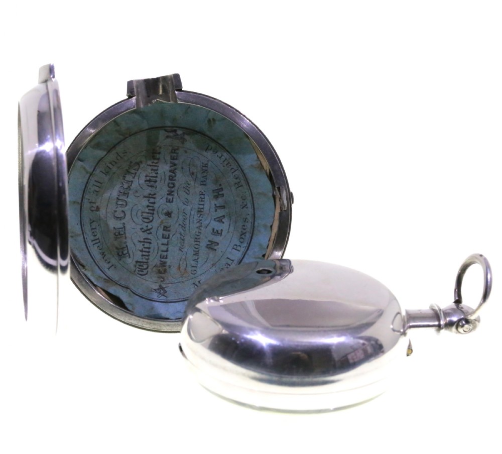 A Victorian silver verge pair cased pocket watch with a white dial and black Roman numerals. View V