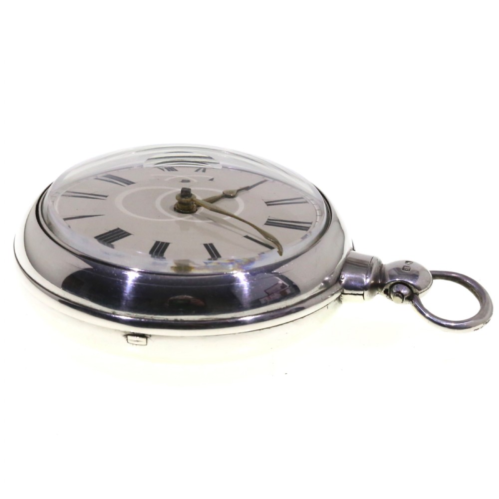 A Victorian silver verge pair cased pocket watch with a white dial and black Roman numerals. View VIII
