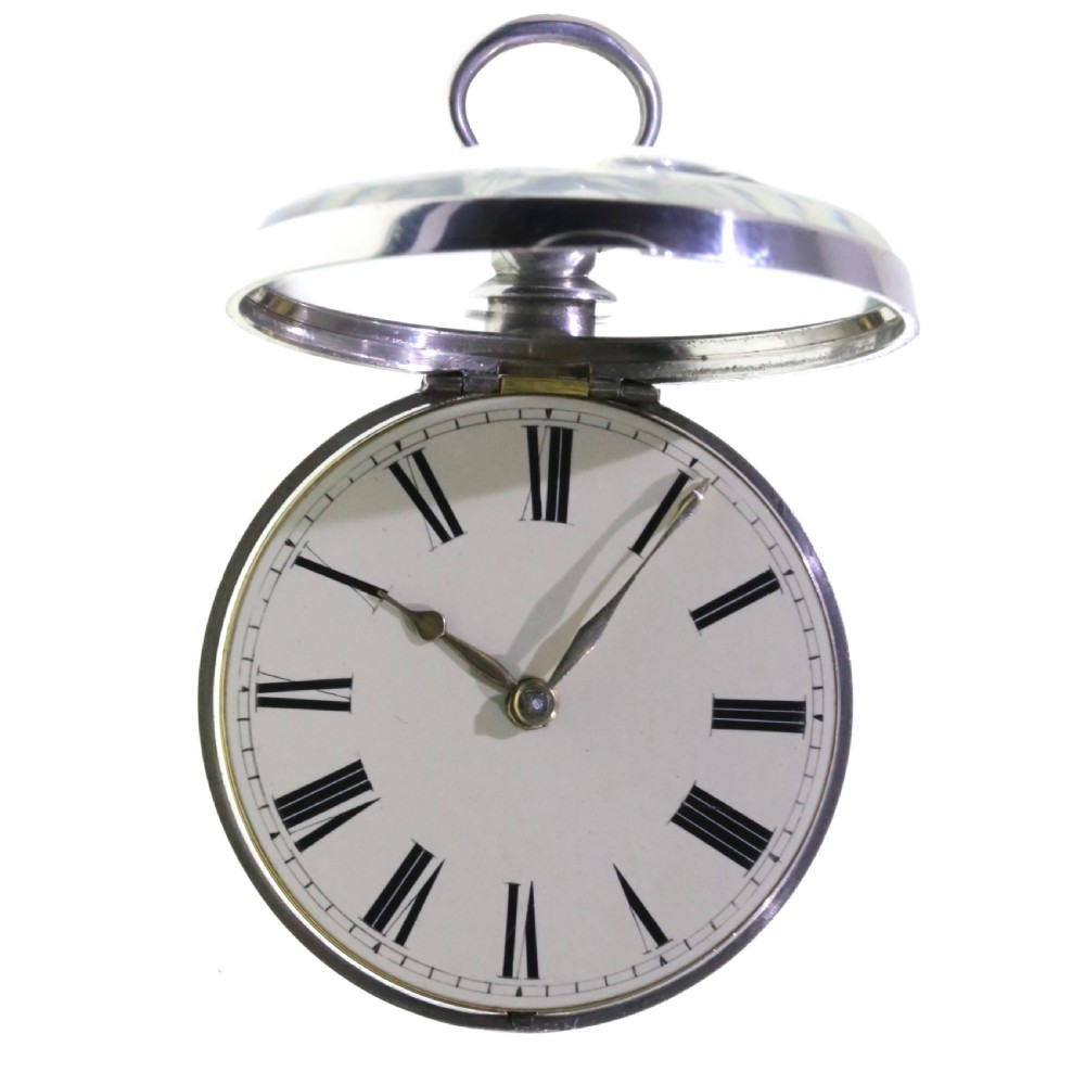 A Victorian silver verge pair cased pocket watch with a white dial and black Roman numerals. View IX