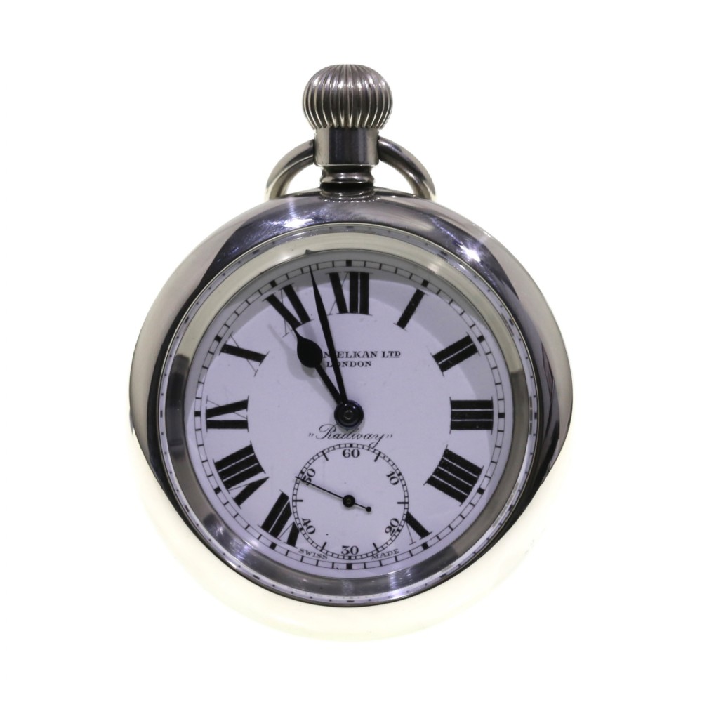An open-face silver pocket watch featuring a white enamel dial with black Roman numerals, spade hands, and a sub-seconds dial.