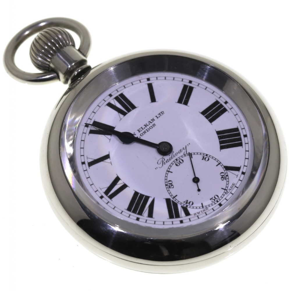 An open-face silver pocket watch featuring a white enamel dial with black Roman numerals, spade hands, and a sub-seconds dial. View II