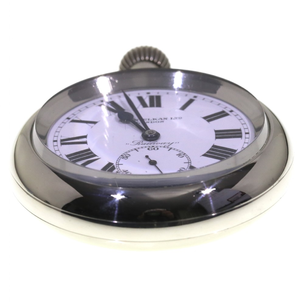An open-face silver pocket watch featuring a white enamel dial with black Roman numerals, spade hands, and a sub-seconds dial. View IX