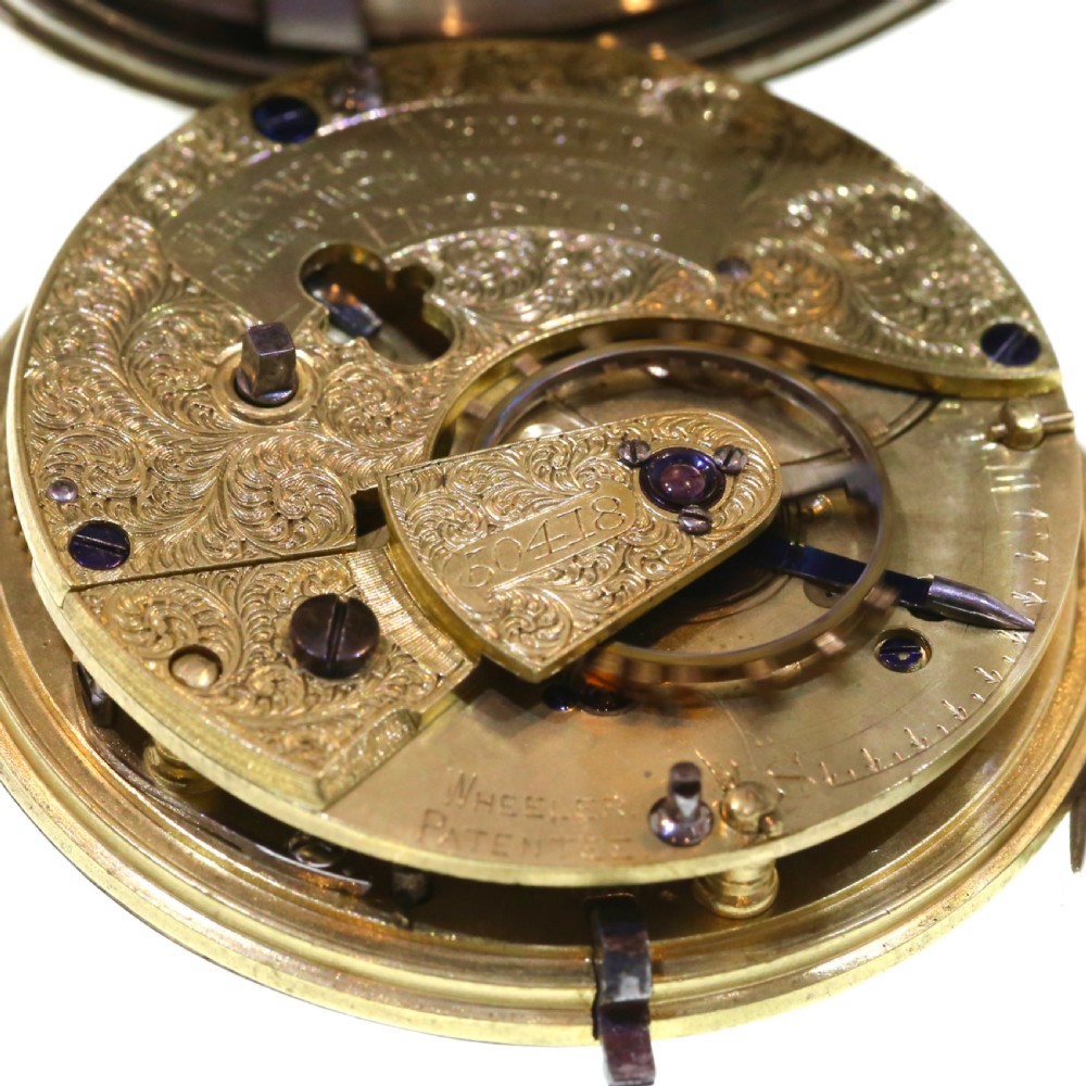 A Victorian silver pocket watch displaying a white enamel dial with black Roman numerals, dark steel hands, a subsidiary seconds dial, and an attached silver hanging loop. View VIII