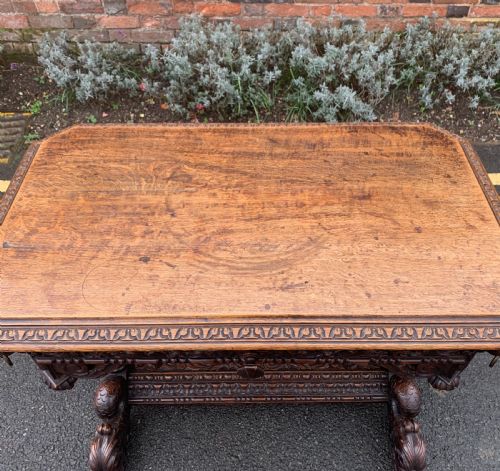 CONTINENTAL CARVED OAK CENTRE TABLE - ADDITIONAL PHOTO 6
