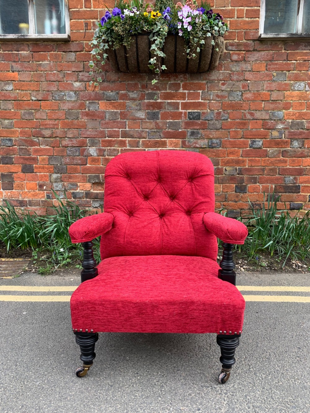 Victorian Ebonised open armchair 