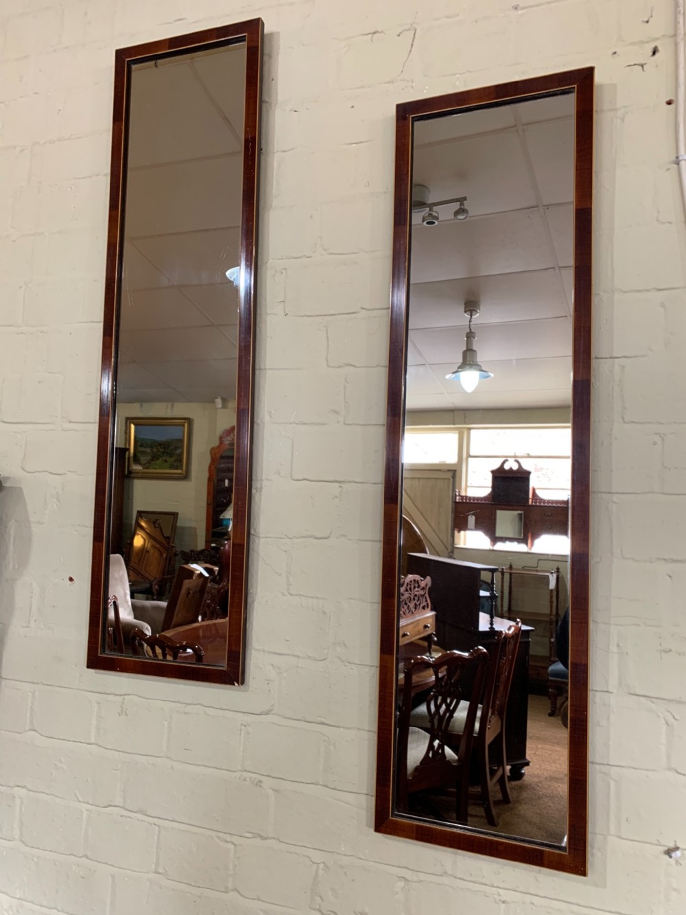 Pair of Yew pier mirrors 