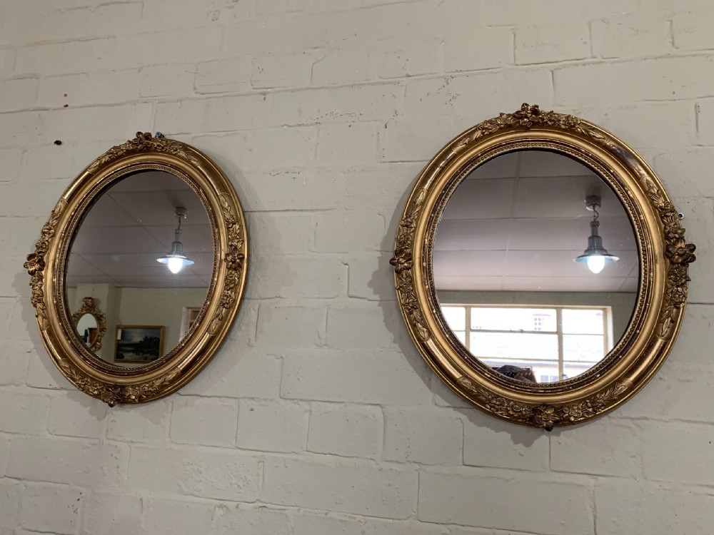 Pair of small Nineteenth century gilt mirrors