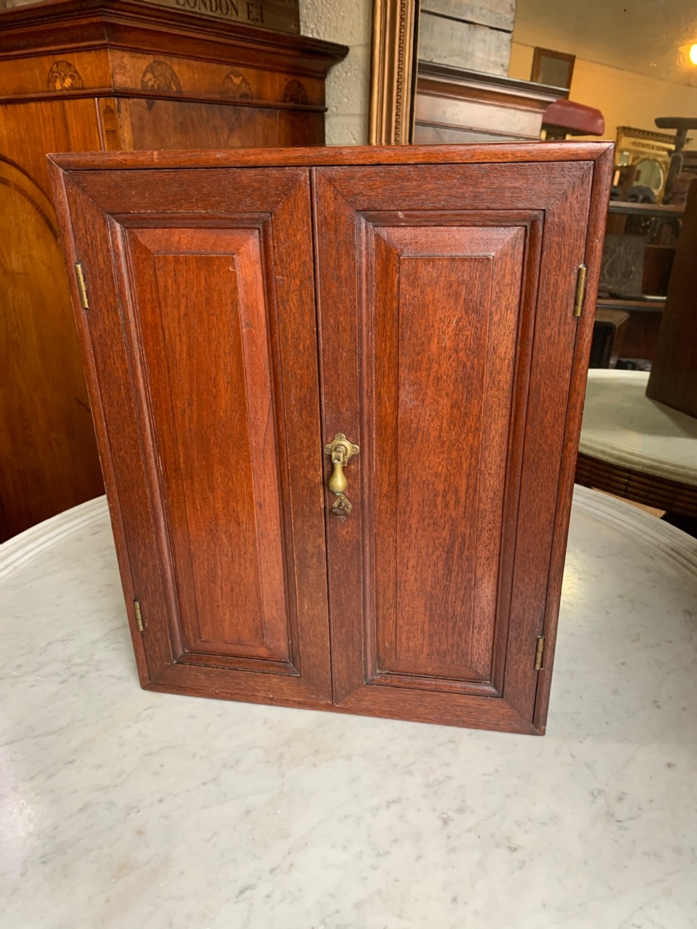 Small colonial teak cupboard  View II