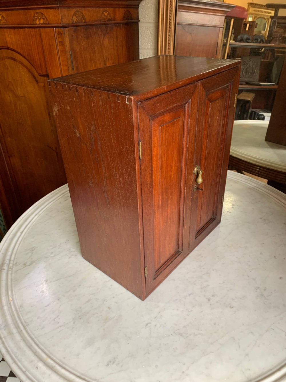 Small colonial teak cupboard  View V