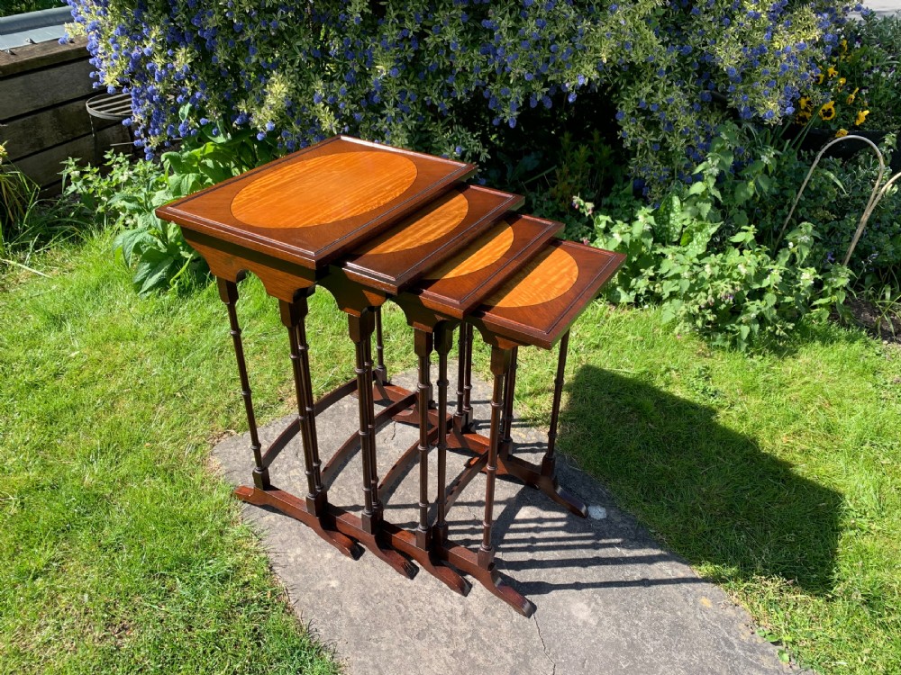 Nest of four tables 