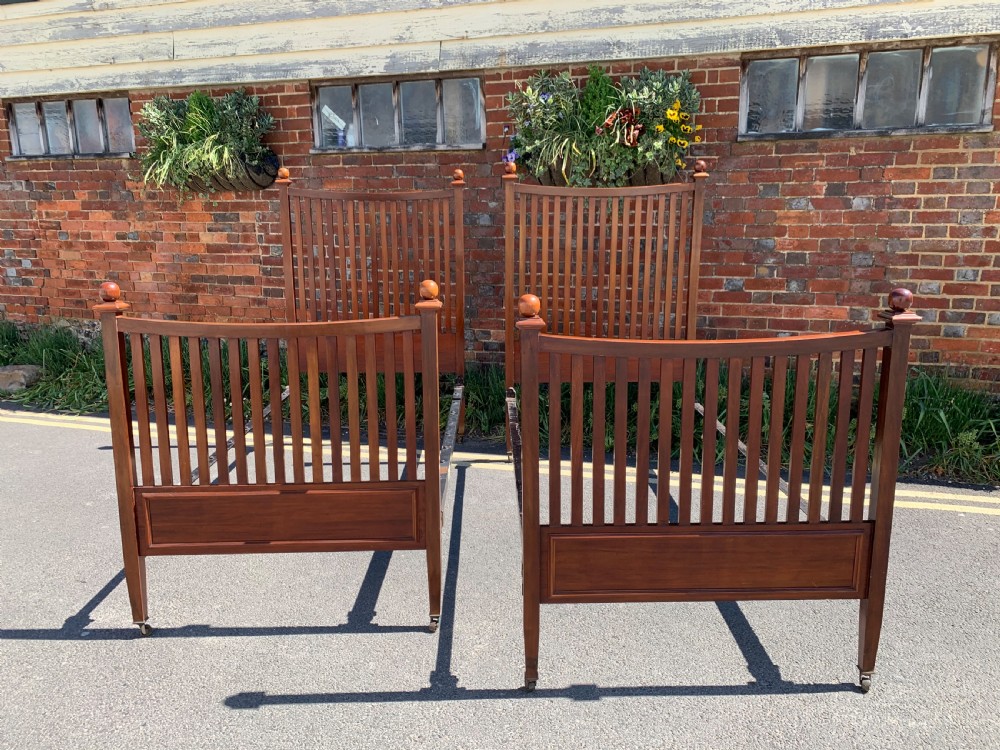 Pair of Mahogany single beds