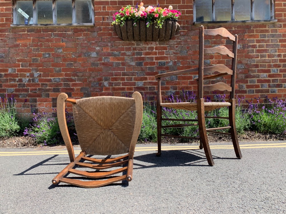 Pair of Arts and Crafts oak armchairs  View III