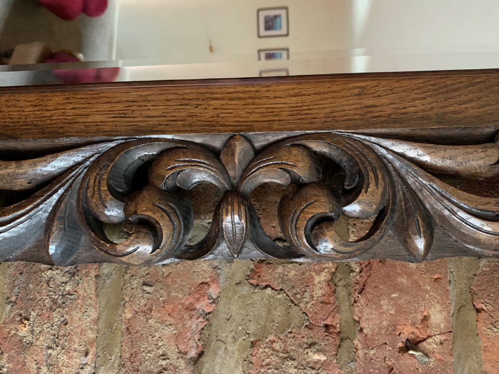 Carved oak overmantle mirror  View II