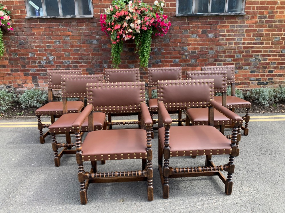 Set of eight oak and leather chairs 