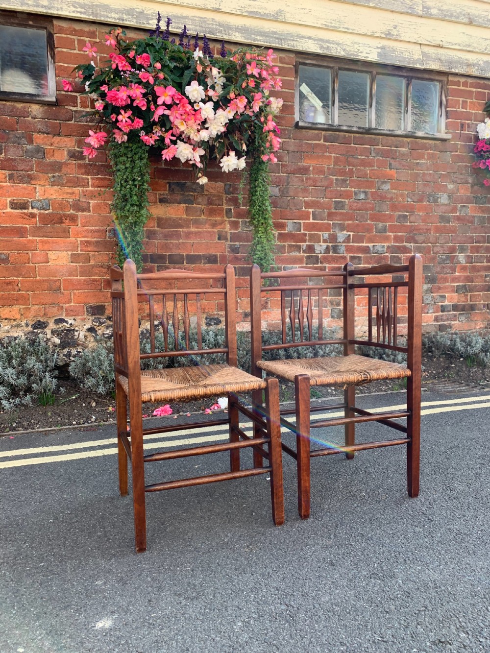 Pair of Arts and Crafts corner chairs 