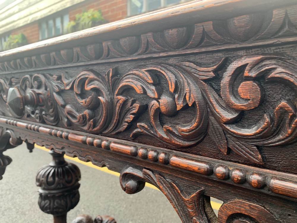 Continental carved Oak centre table  View III