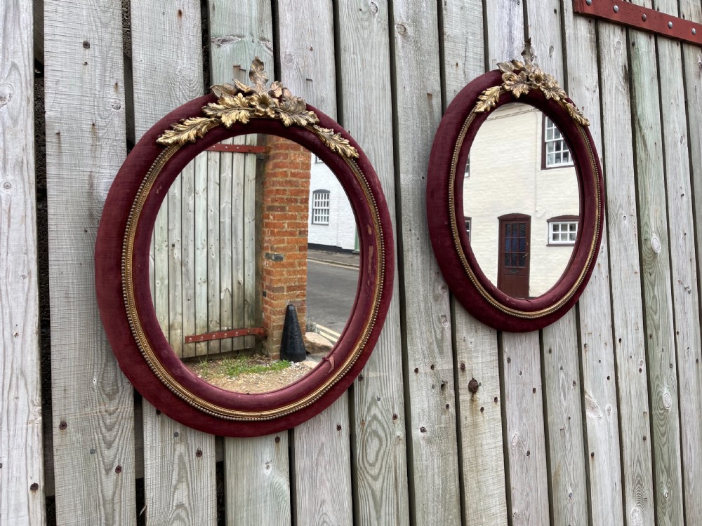 Pair of Victorian velvet covered mirrors 