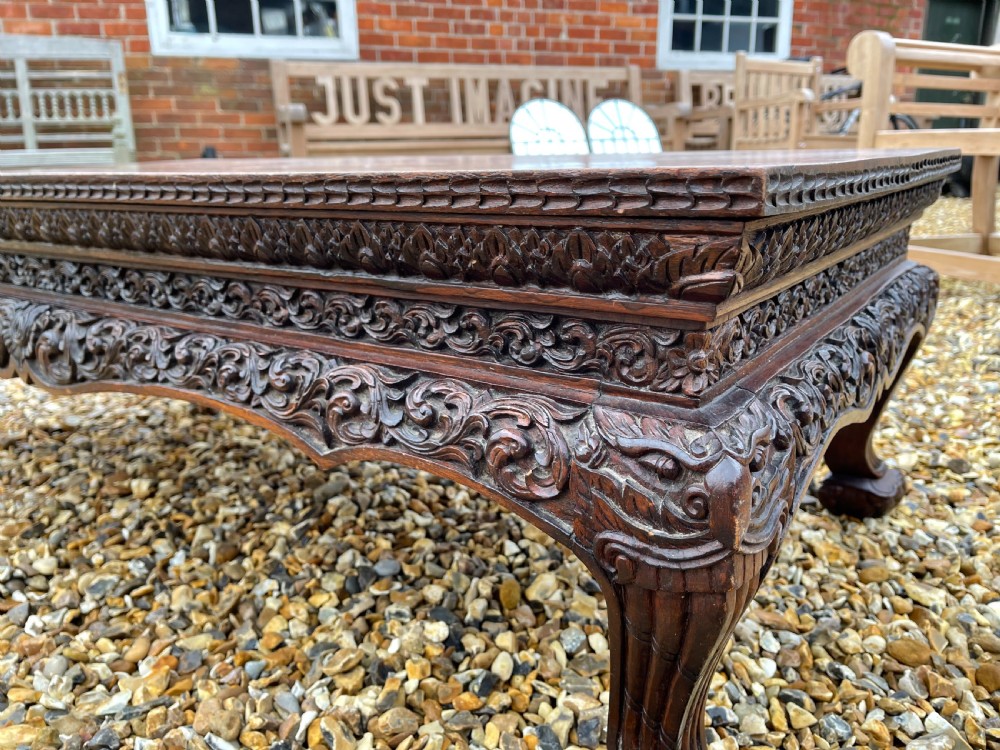 Carved teak coffee table  View V