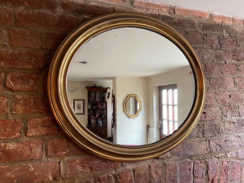Victorian brass framed mirror 